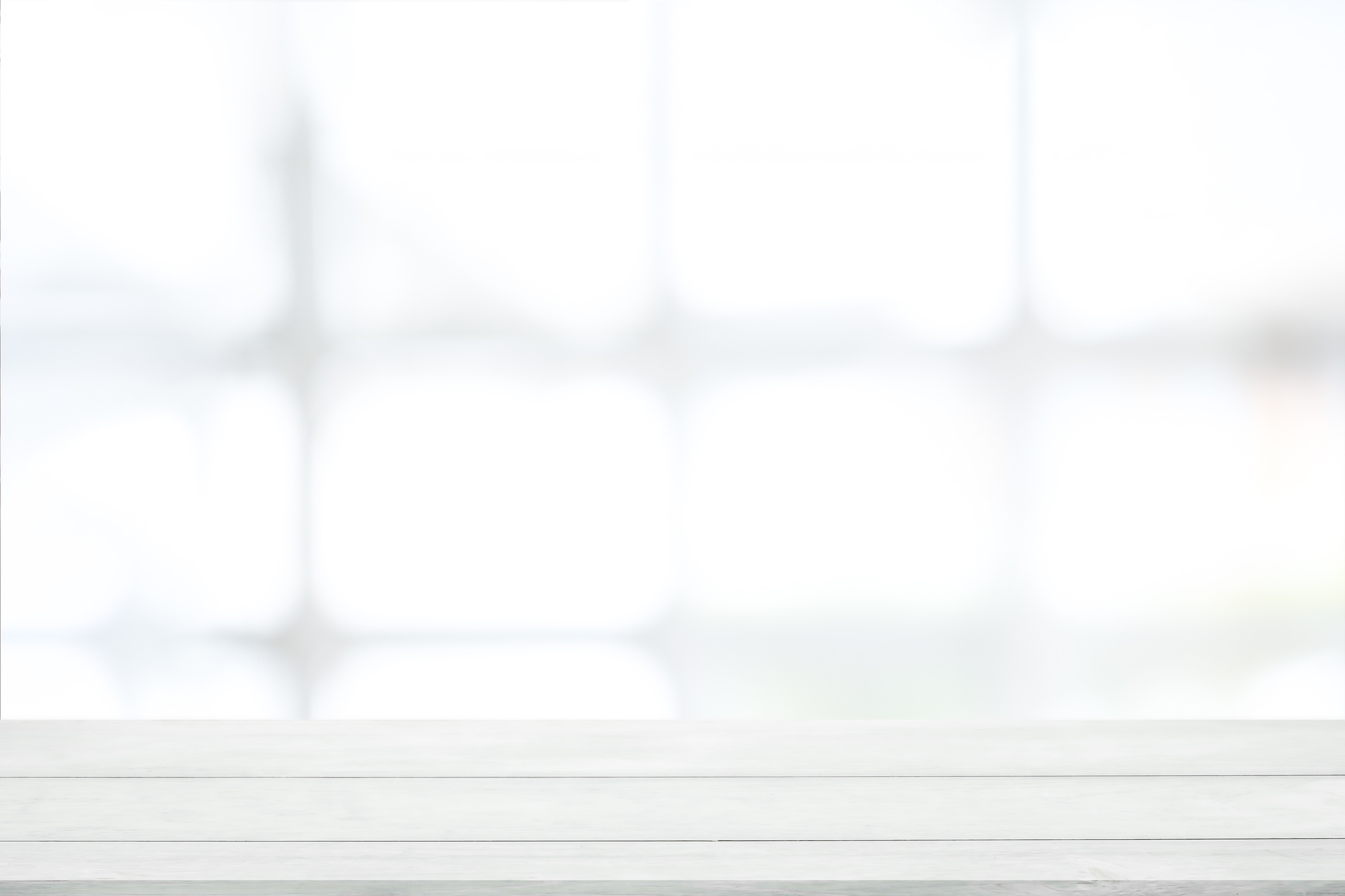 Empty White Wooden Table with Blurred Background